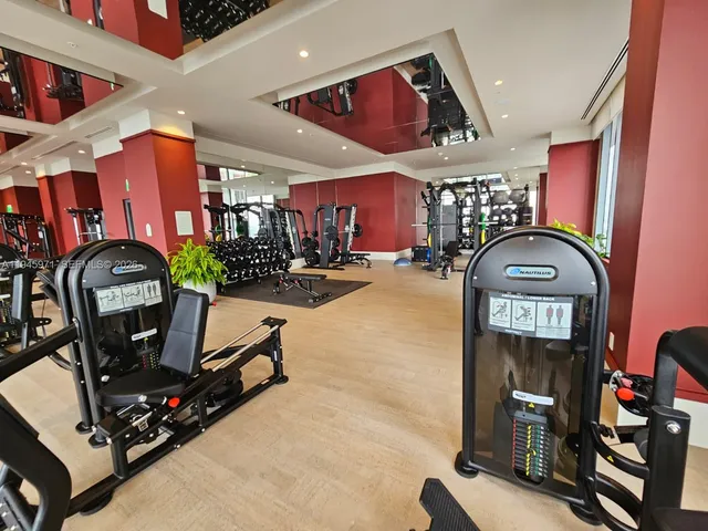 a kitchen with stainless steel appliances granite countertop a stove and a refrigerator