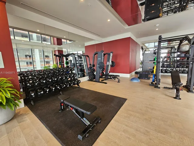 a room with furniture and wooden floor