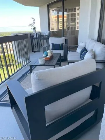 a living room with furniture and window