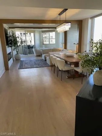a living room with furniture and window