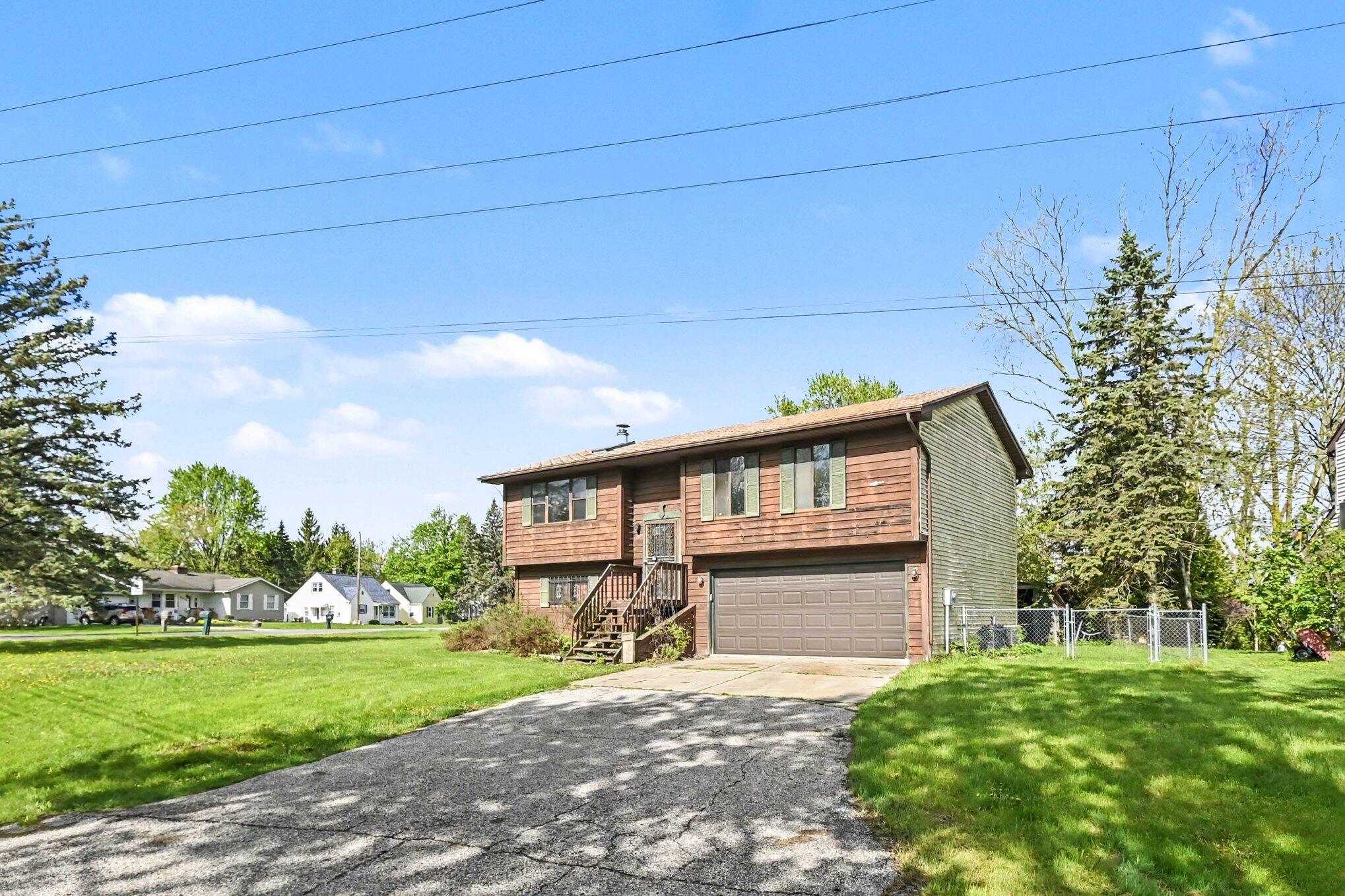 6002 Bishop Road Lansing, MI 48911 - Photo 2 of 19 002_file_4674