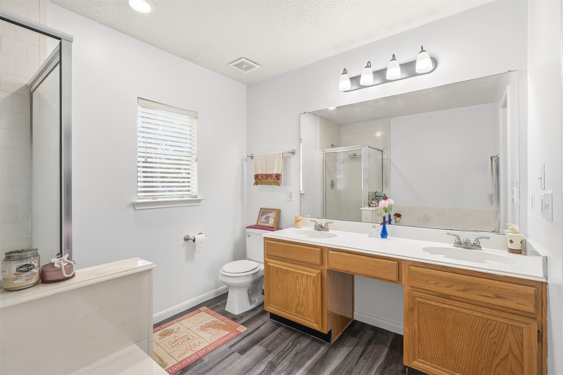 28723 Sedgefield Street Spring, TX 77386 - Photo 12 of 20 a bathroom with a double vanity sink mirror and toilet