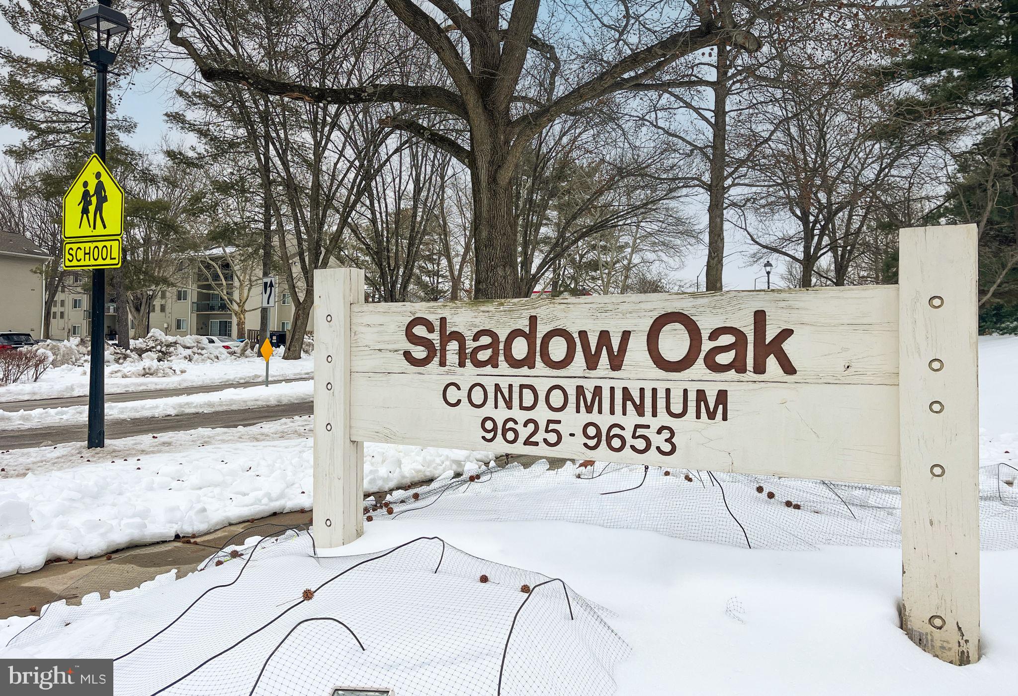 9645 White Acre Road, Unit A2 Columbia, MD 21045 - Photo 21 of 25 a sign that is on the side of the road