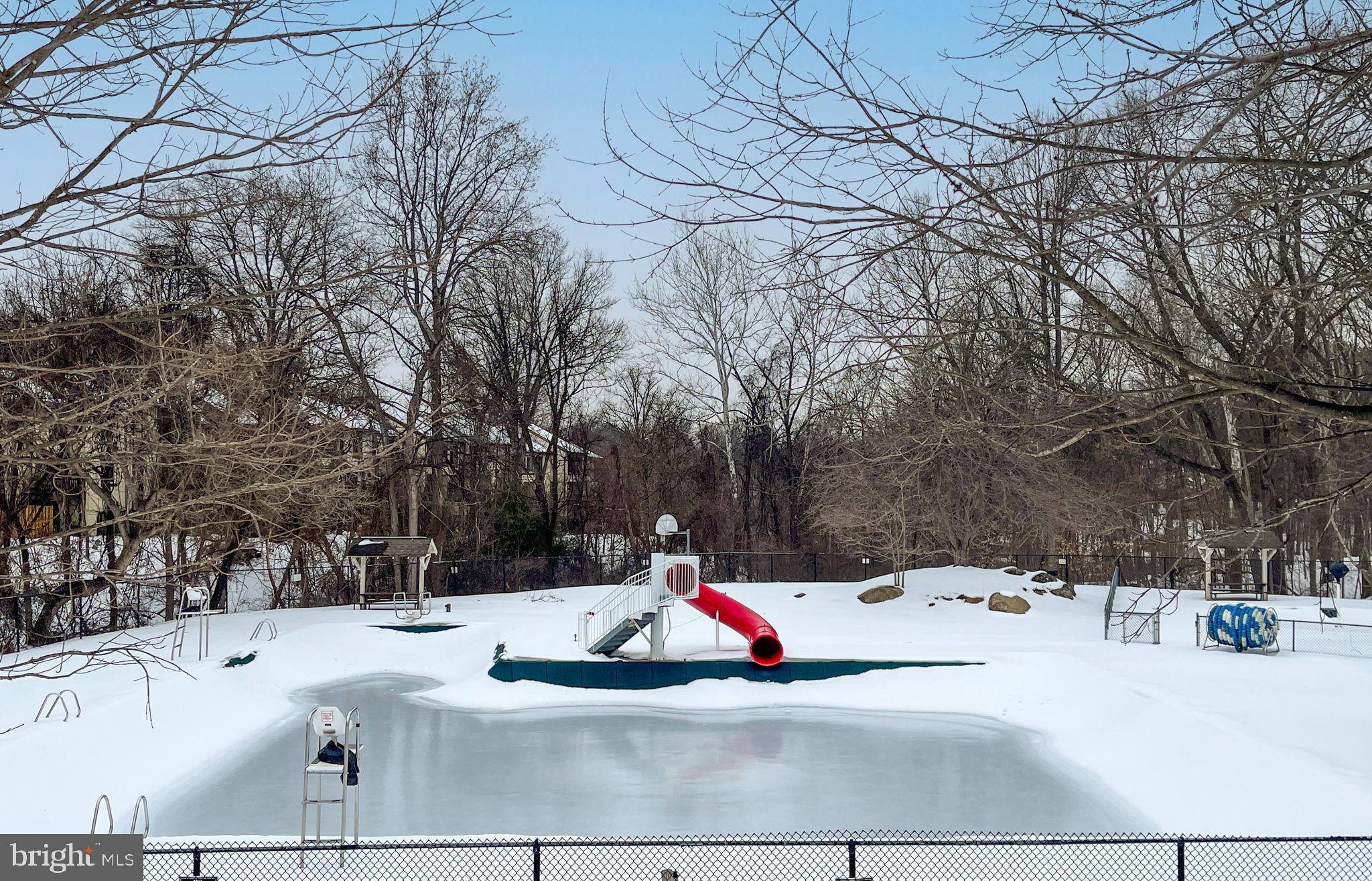 9645 White Acre Road, Unit A2 Columbia, MD 21045 - Photo 23 of 25 a view of outdoor space yard and swimming pool