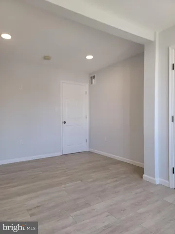 a bathroom with a tub shower vanity and a shower