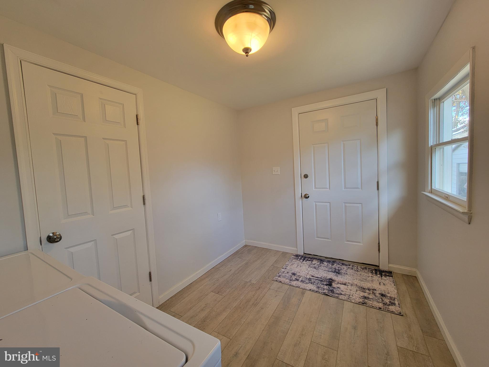 2621 North Snyder Avenue Sparrows Point, MD 21219 - Photo 25 of 65 a view of kitchen with wooden floor
