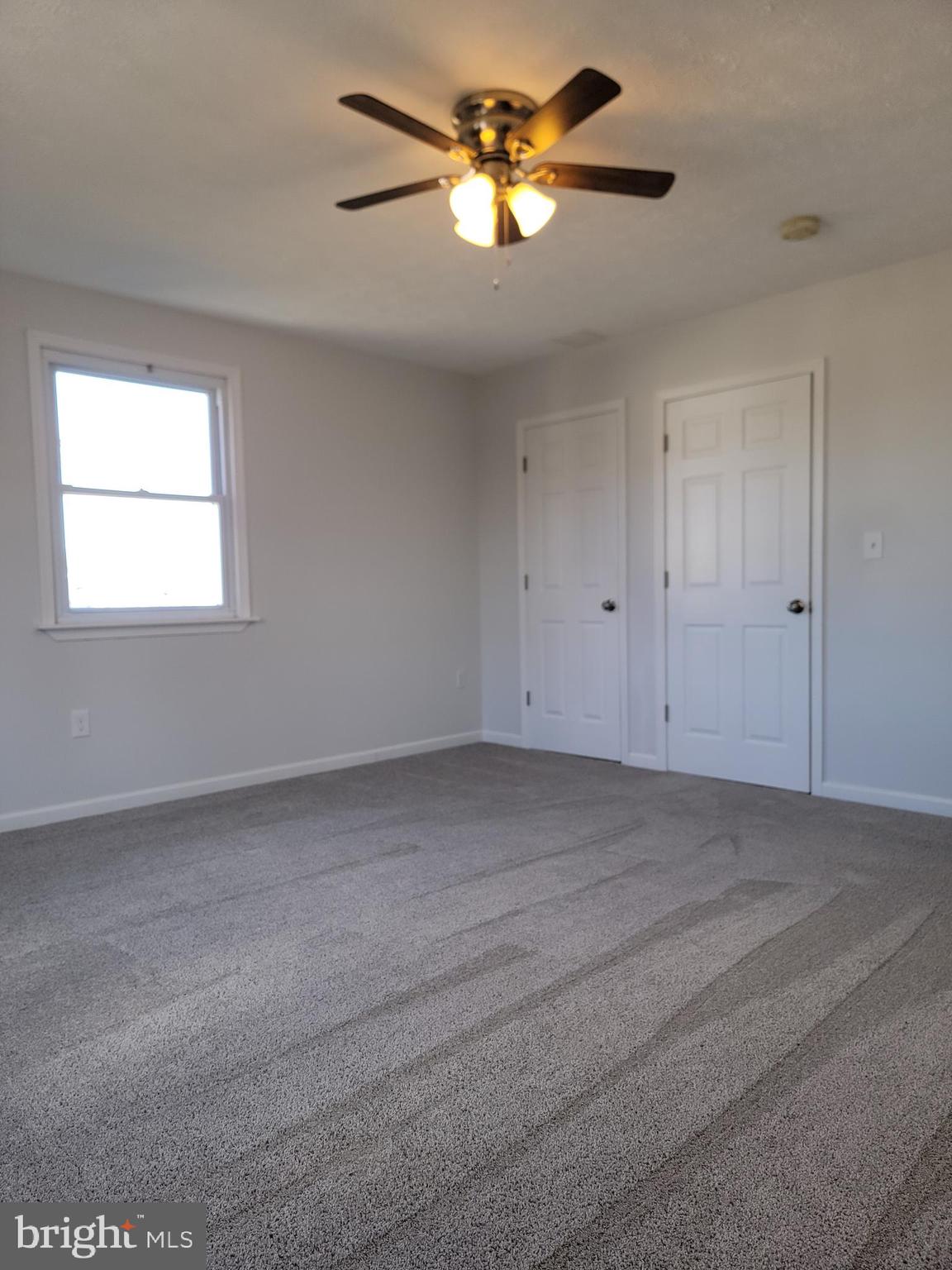 2621 North Snyder Avenue Sparrows Point, MD 21219 - Photo 28 of 65 a view of a livingroom with a ceiling fan and window