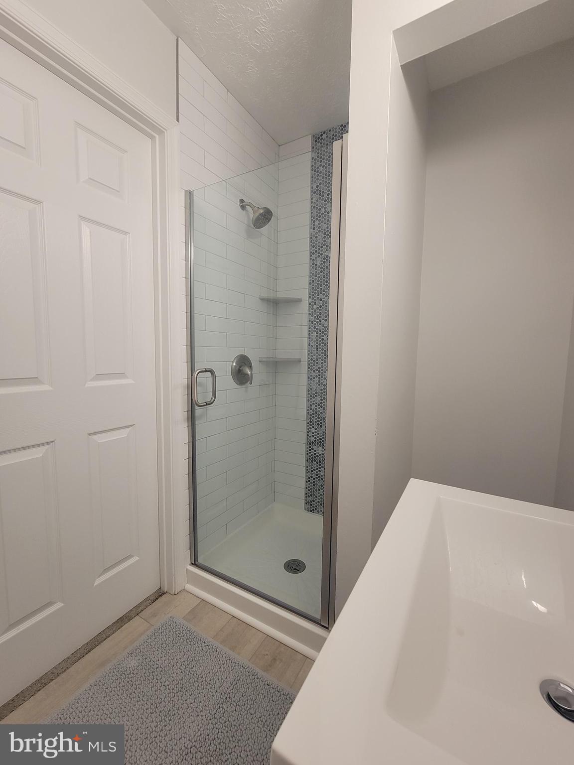 2621 North Snyder Avenue Sparrows Point, MD 21219 - Photo 36 of 65 a bathroom with a bathtub and shower