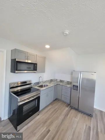 a bathroom with a shower and a toilet