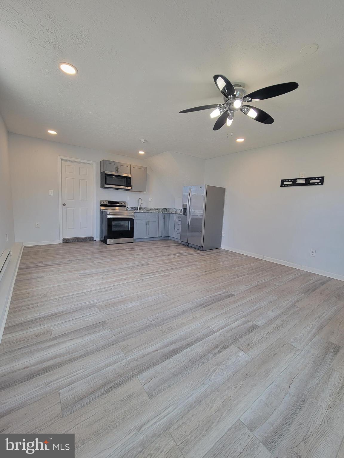 2621 North Snyder Avenue Sparrows Point, MD 21219 - Photo 42 of 65 a view of a kitchen with microwave and cabinets