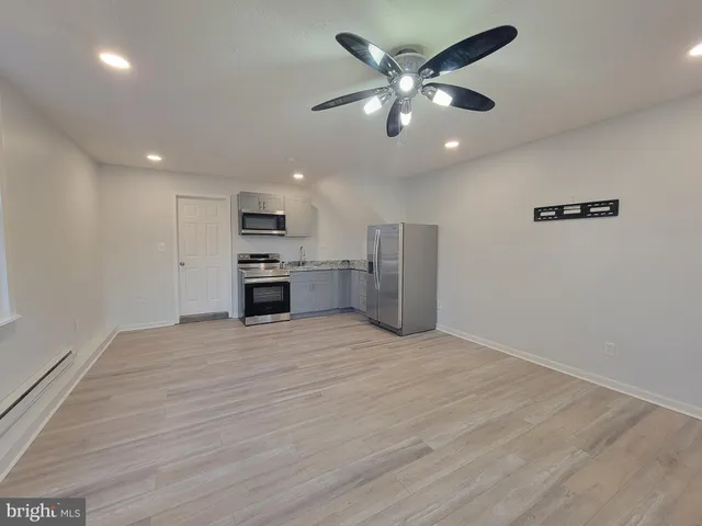 a bathroom with a sink toilet and vanity