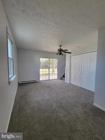 a house view with a swimming pool