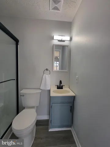 a view of a backyard of the house