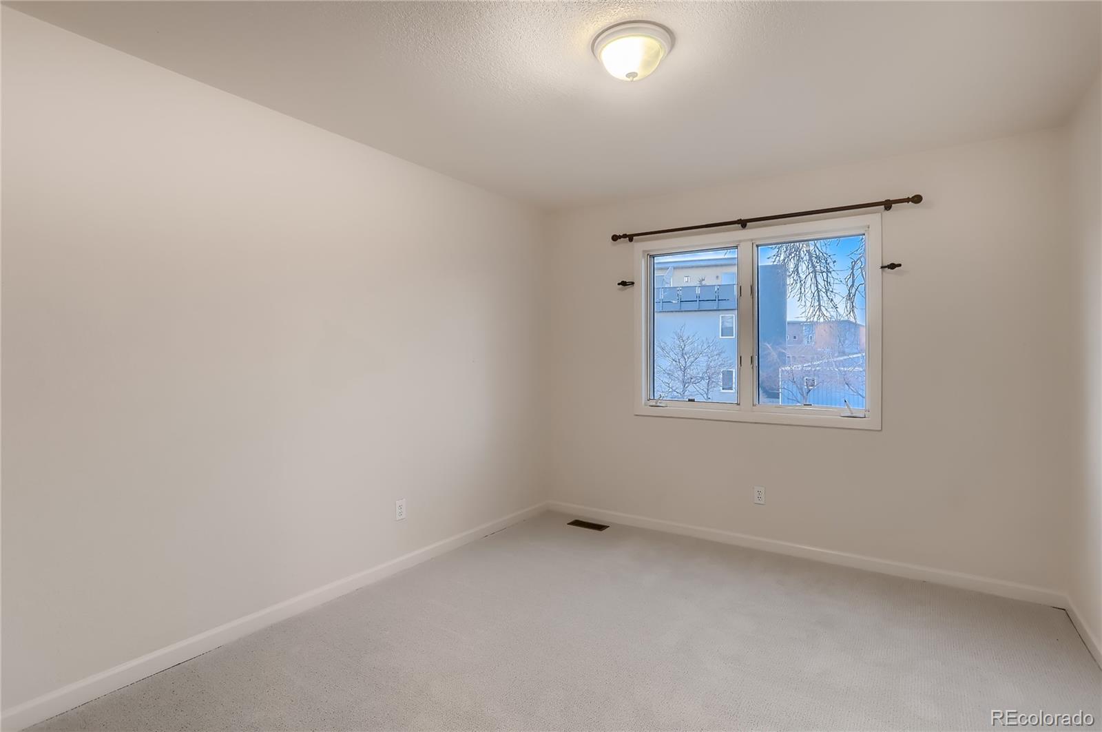 4640 15th Street, Unit D Boulder, CO 80304 - Photo 21 of 28 an empty room with a window