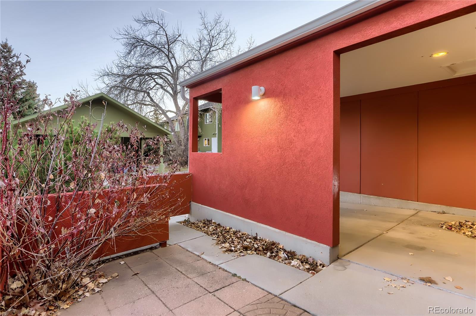 4640 15th Street, Unit D Boulder, CO 80304 - Photo 25 of 28 a front view of a house with a yard