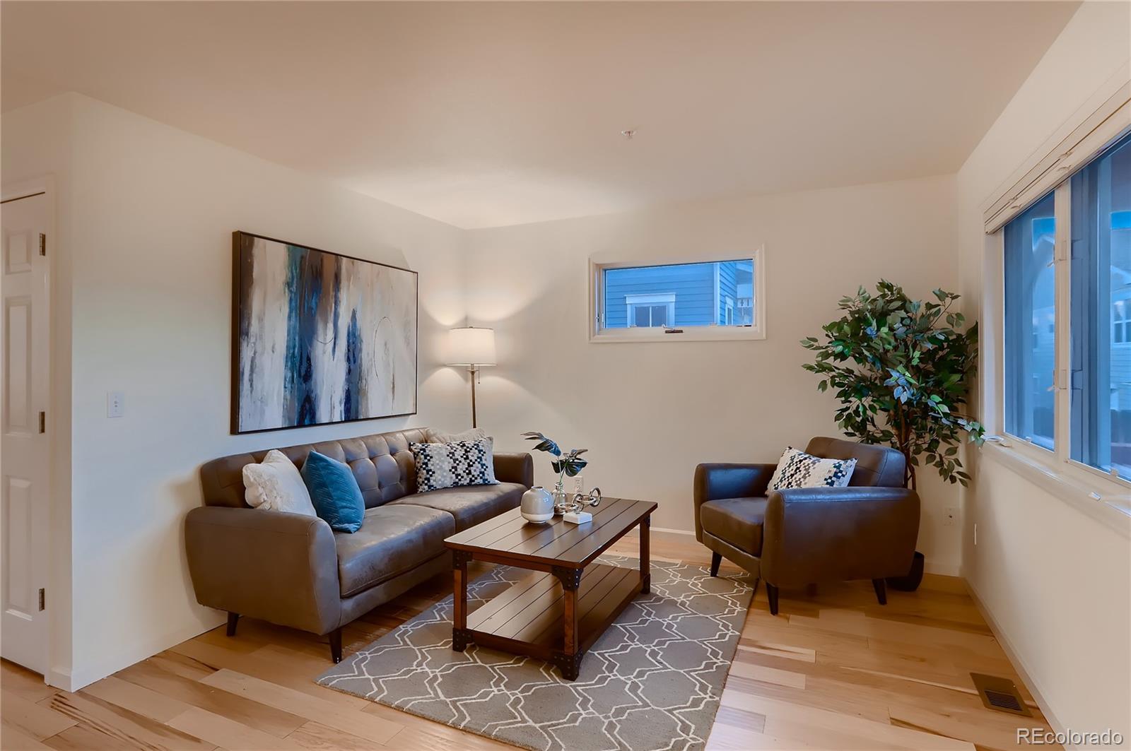 4640 15th Street, Unit D Boulder, CO 80304 - Photo 5 of 28 a living room with furniture and a potted plant