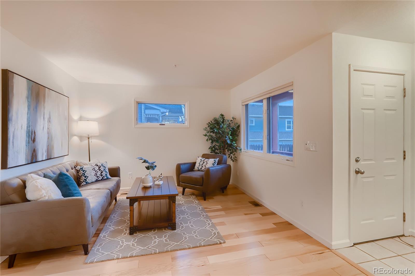 4640 15th Street, Unit D Boulder, CO 80304 - Photo 8 of 28 a living room with furniture and wooden floor
