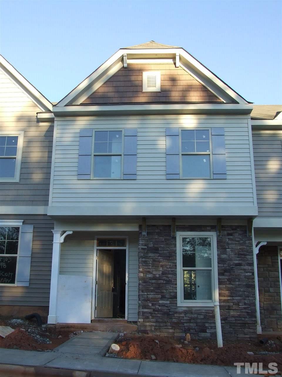 7916 Allscott Way Raleigh, NC 27612 - Photo 1 of 3 a front view of a house