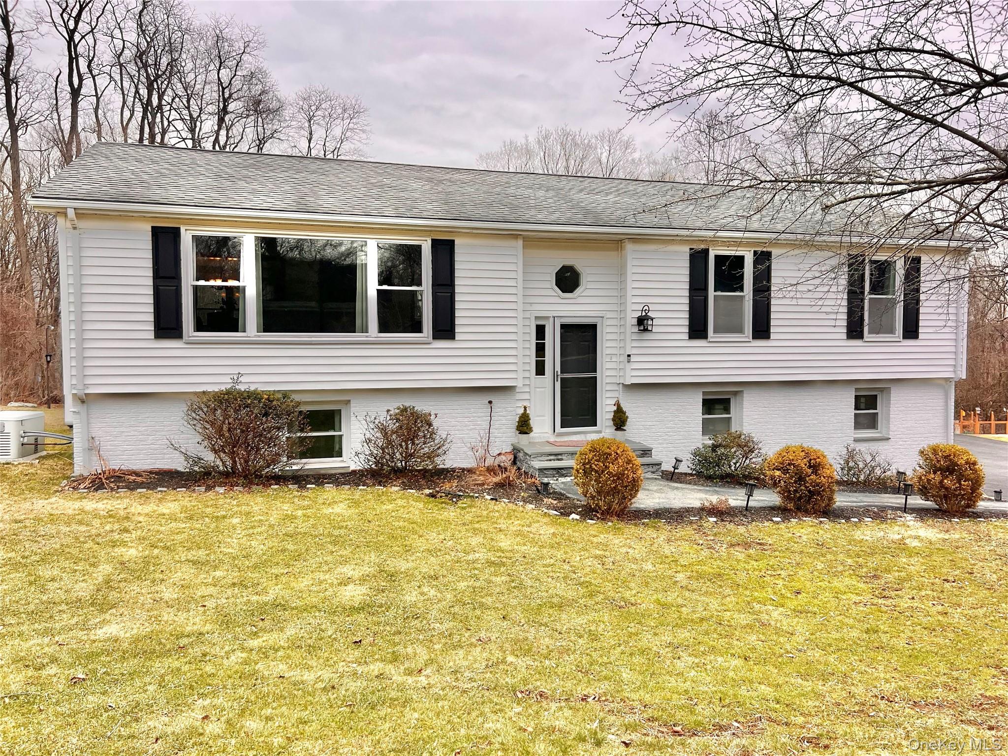 4 Stonewall Farm Road Mahopac, NY 10541 - Photo 1 of 37 Welcome to 4 Stonewall Farm Road, Mahopac. A rare legal mother/ daughter with walk out lower level apartment great for extended family.