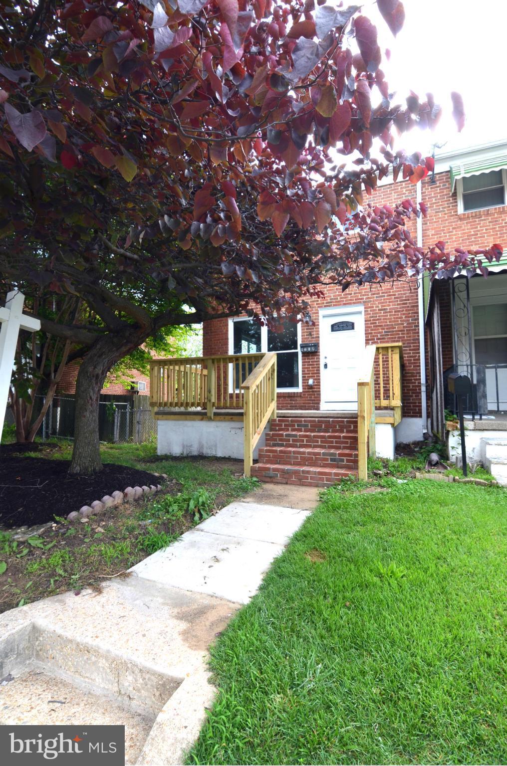 8254 Kavanagh Road Baltimore, MD 21222 - Photo 1 of 20 a view of a house with a yard