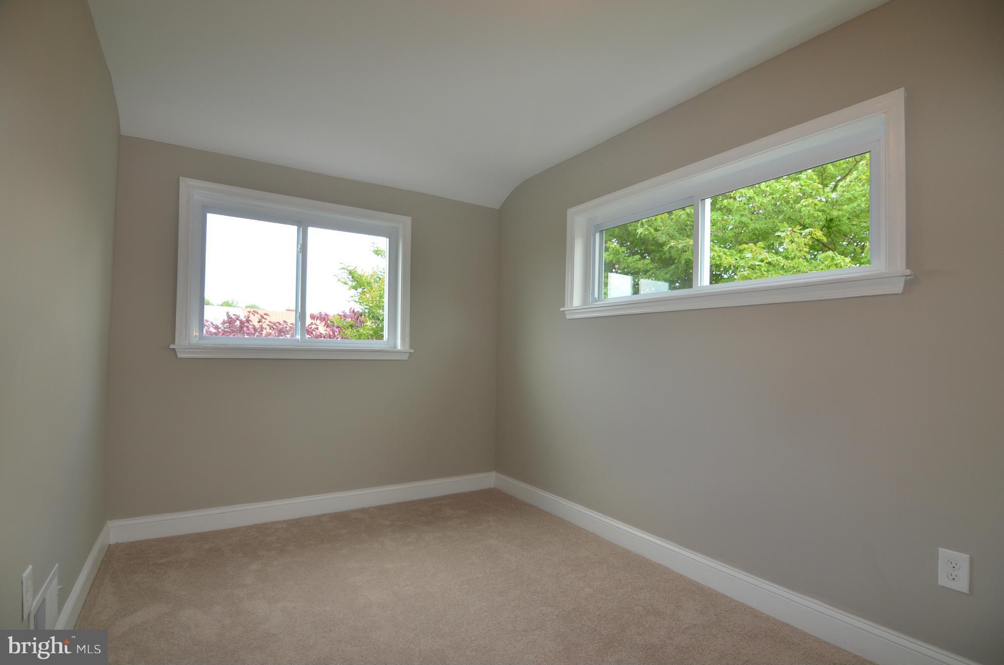 8254 Kavanagh Road Baltimore, MD 21222 - Photo 14 of 20 an empty room with a window