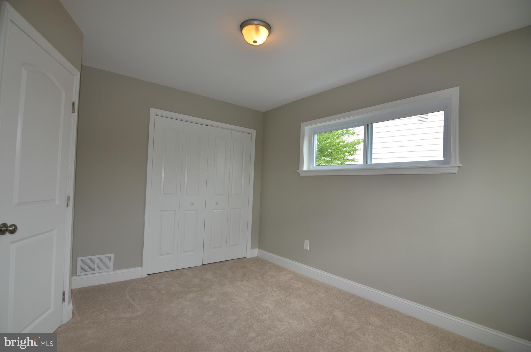 8254 Kavanagh Road Baltimore, MD 21222 - Photo 15 of 20 an empty room with windows