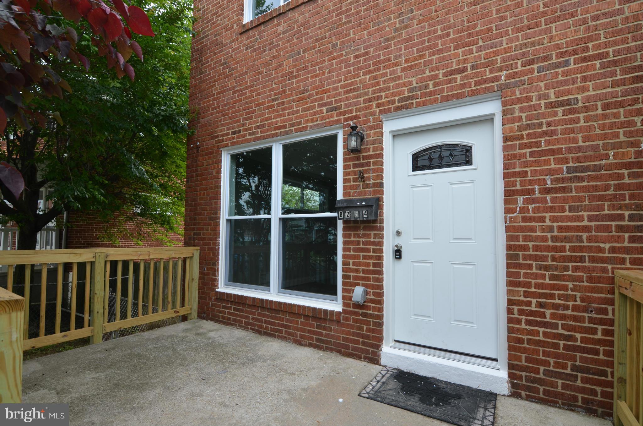 8254 Kavanagh Road Baltimore, MD 21222 - Photo 19 of 20 a view of a house with a large window