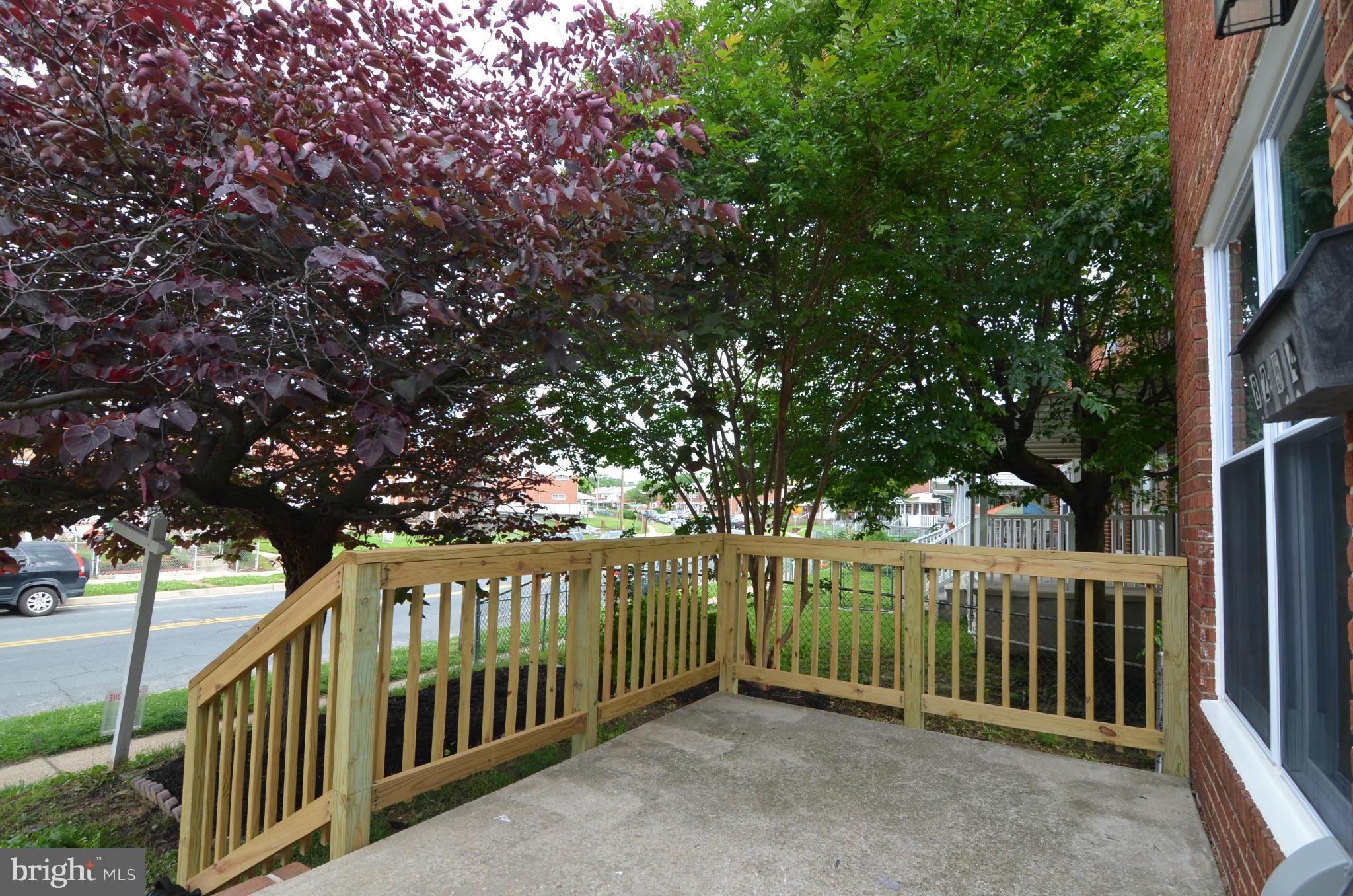 8254 Kavanagh Road Baltimore, MD 21222 - Photo 20 of 20 a view of a house with a small yard