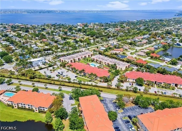 a view of a city with a lake