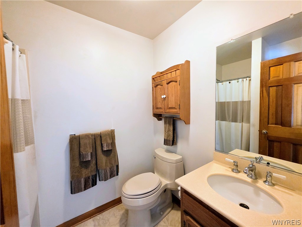 151 Chestnut Street Wilson, NY 14172 - Photo 23 of 30 Guest bath w/ shower and linen closet