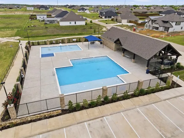a view of a swimming pool and outdoor space