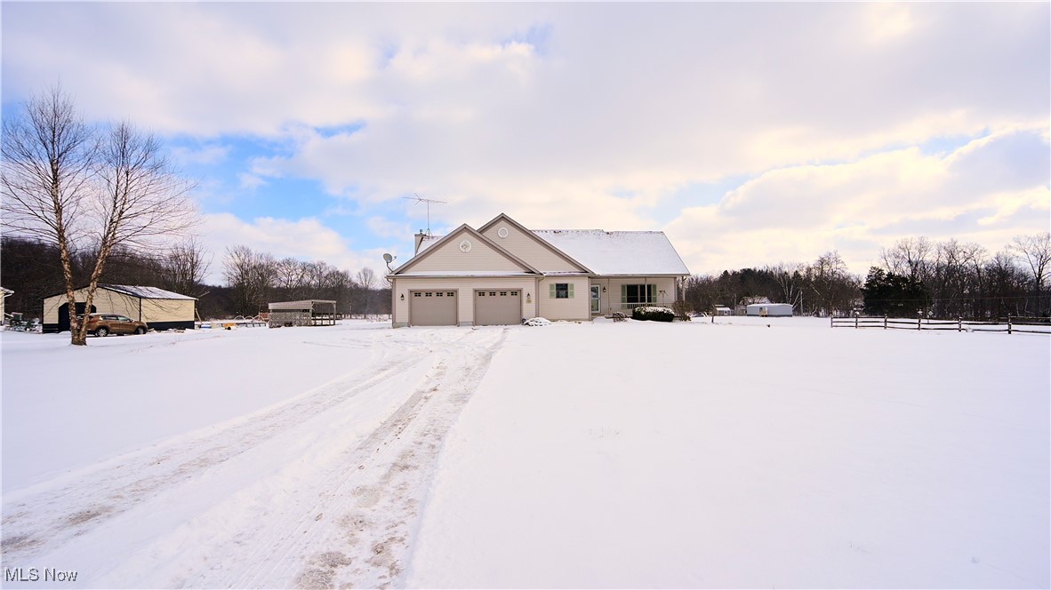 706 Watson Road Deerfield, OH 44411 - Photo 30 of 36 View of front of house featuring a garage