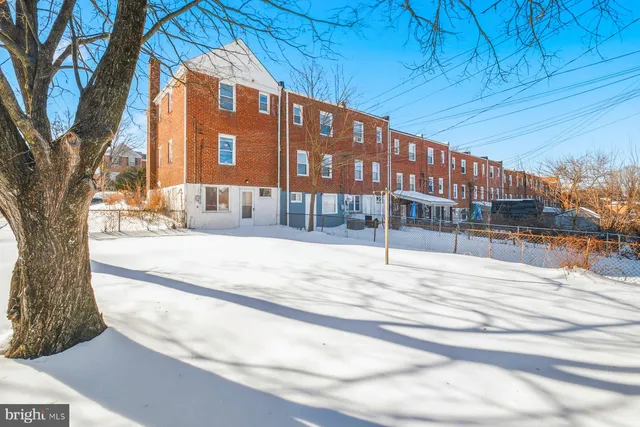 a view of a building with a street