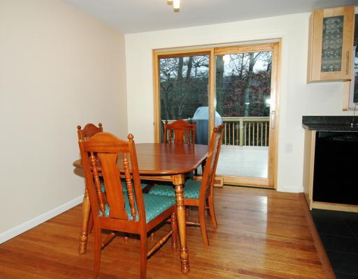 Dining Room. Hardwood floors, new door to deck.