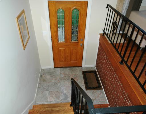 Other. Entry, marble floor, newer door.
