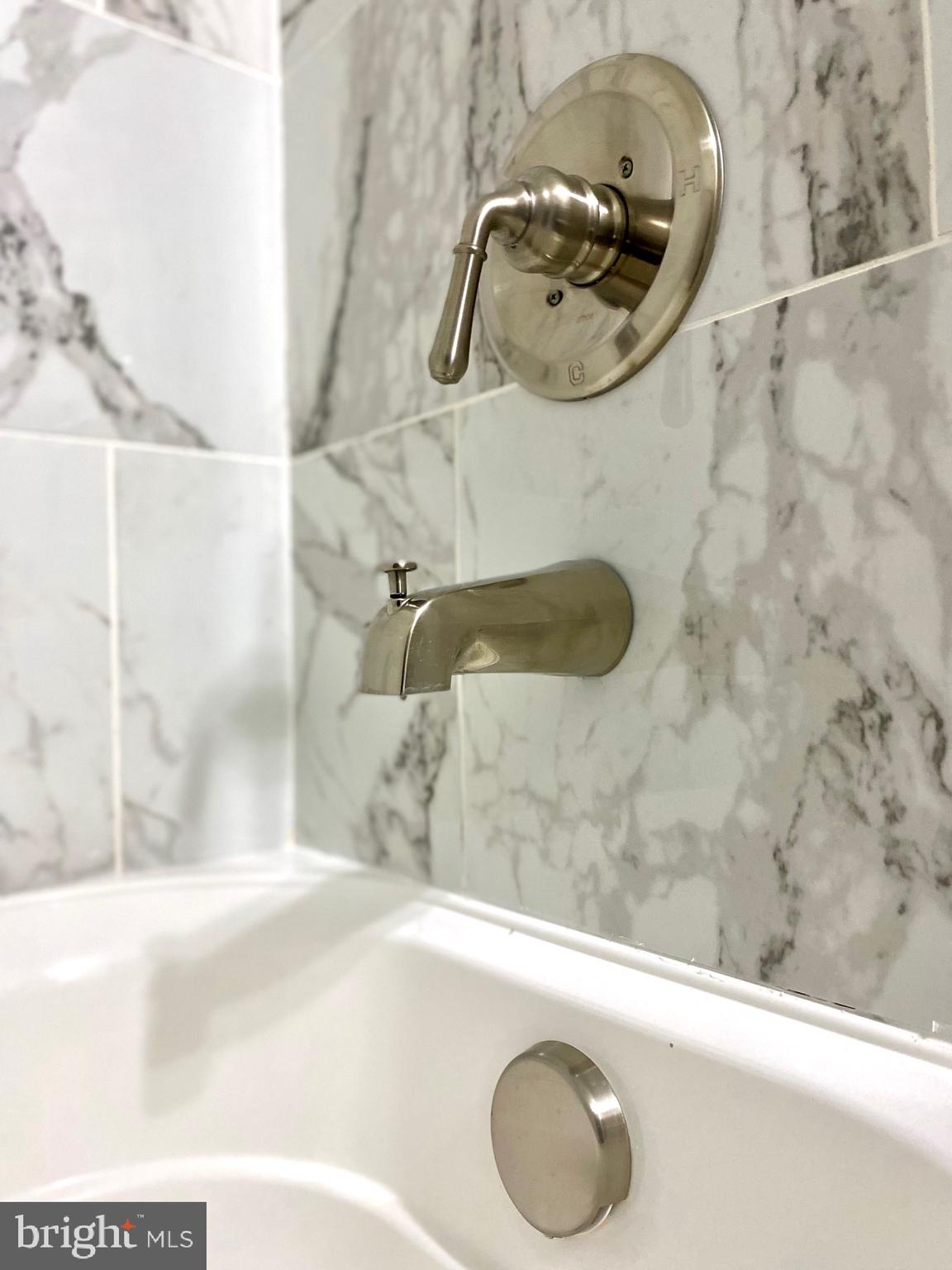 7266 Procopio Circle Columbia, MD 21046 - Photo 9 of 18 a bathroom with a sink and mirror