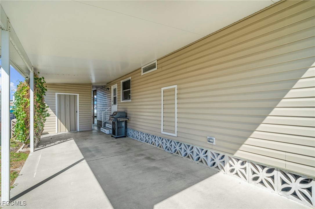 2971 York Road St. James City, FL 33956 - Photo 17 of 23 a view of a house with porch