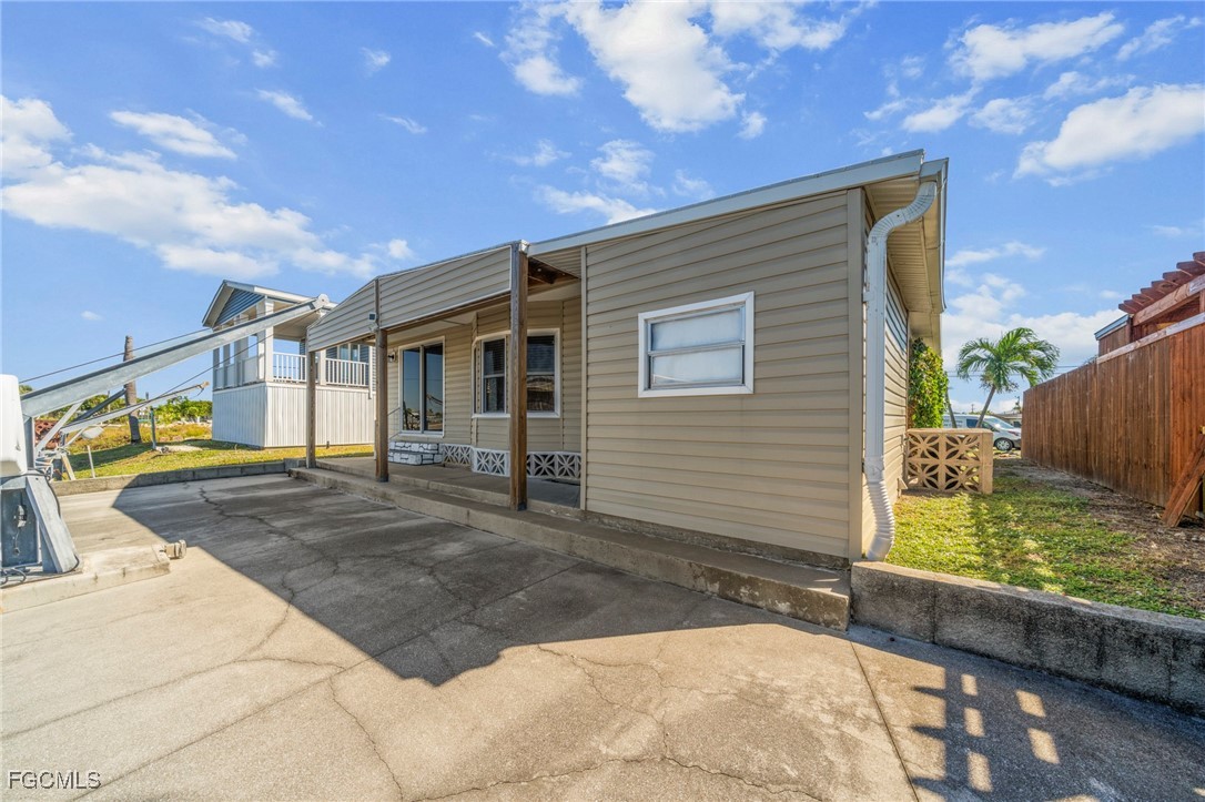 2971 York Road St. James City, FL 33956 - Photo 18 of 23 a view of a backyard