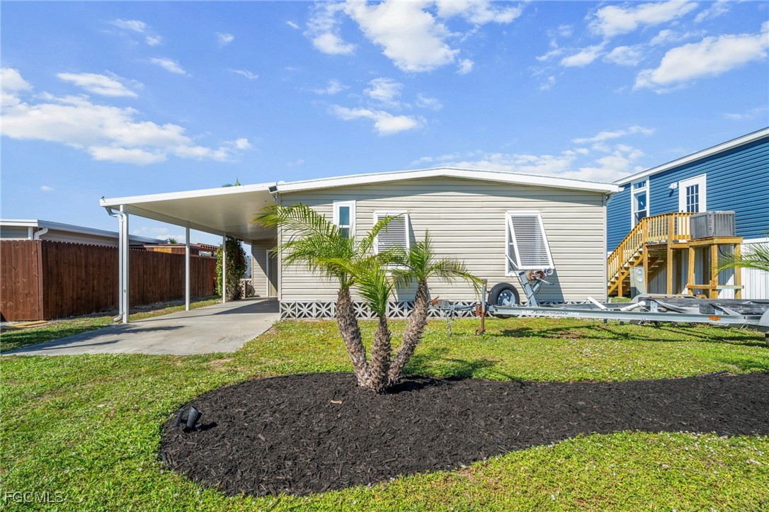 2971 York Road St. James City, FL 33956 - Photo 20 of 23 a view of a house with backyard