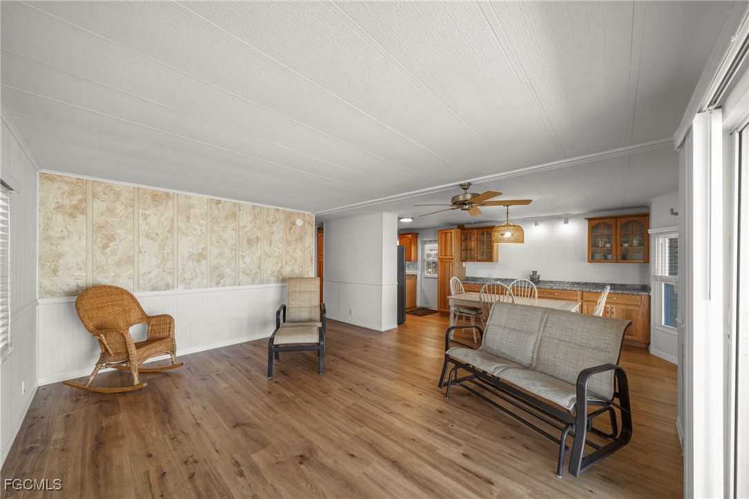 2971 York Road St. James City, FL 33956 - Photo 5 of 23 a living room with furniture and a wooden floor