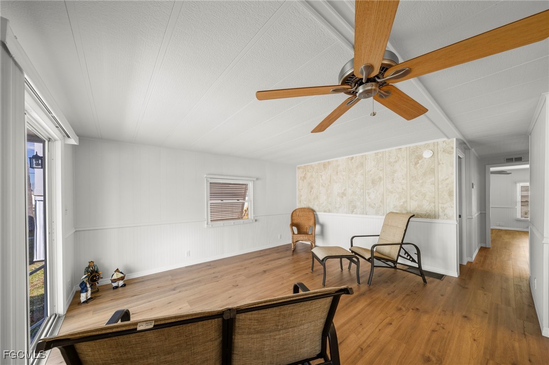 2971 York Road St. James City, FL 33956 - Photo 6 of 23 a workspace with furniture and wooden floor