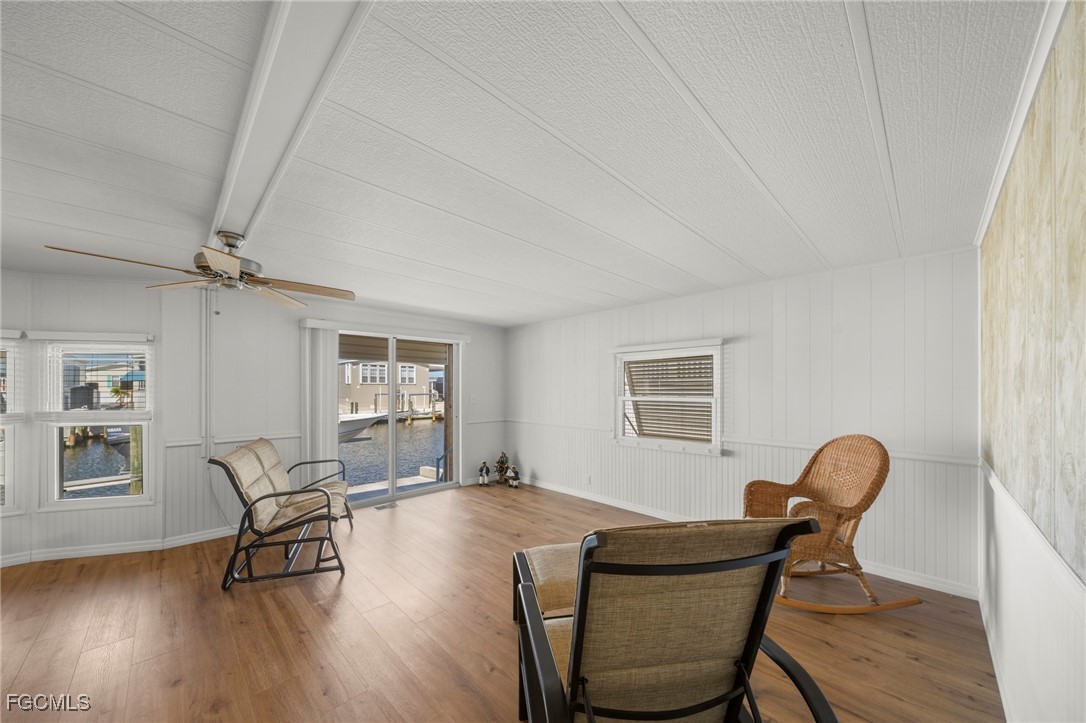2971 York Road St. James City, FL 33956 - Photo 8 of 23 a living room with furniture and a wooden floor