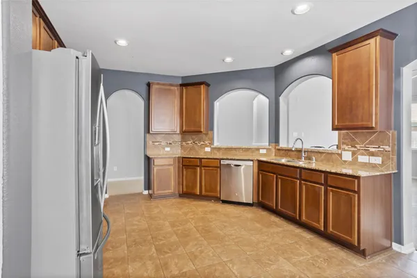 a large bathroom with a double vanity sink and a mirror