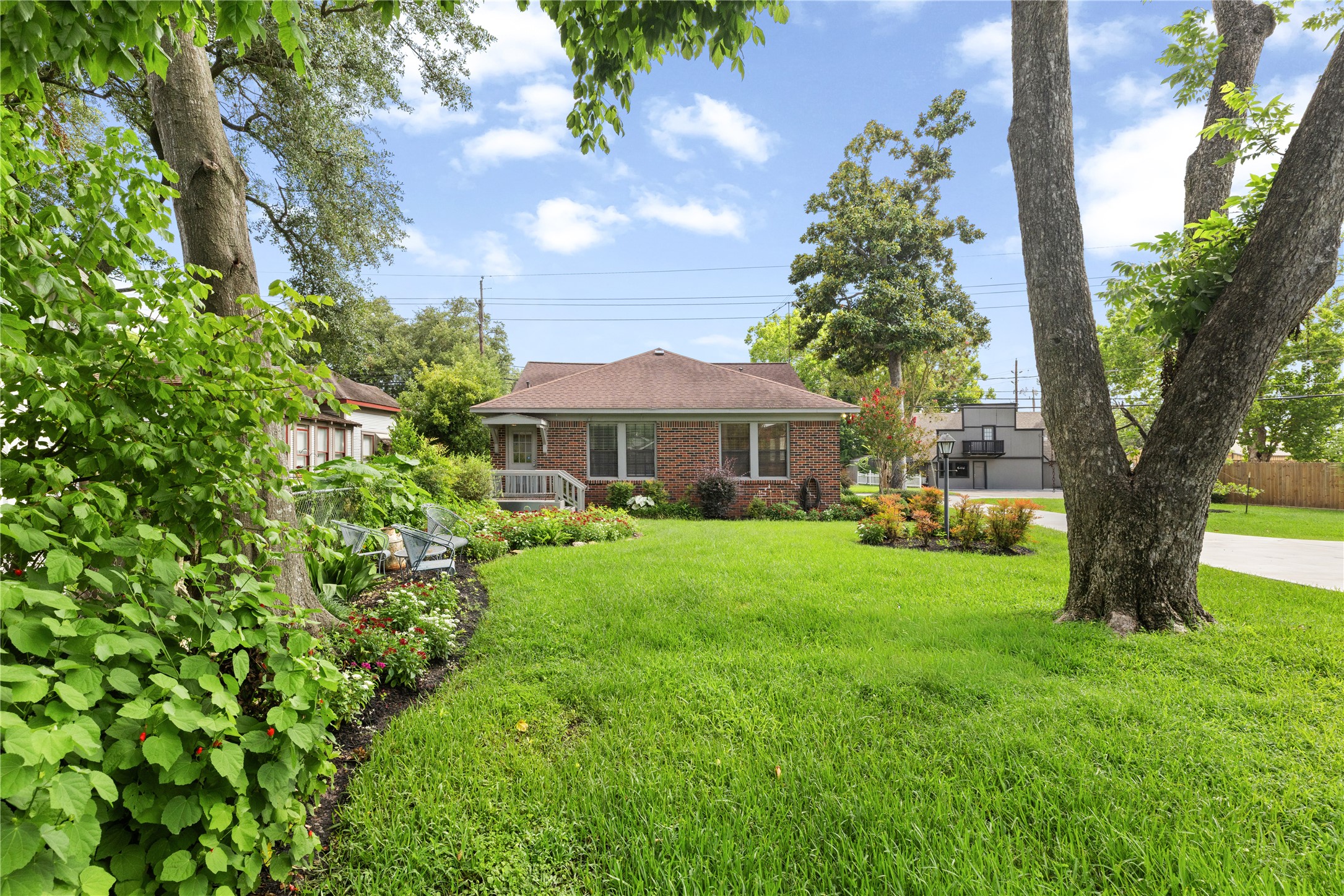 906 Higgins Street Humble, TX 77338 - Photo 6 of 26 the back yard is spacious and perfect for those seeking a serene and inviting outdoor space.