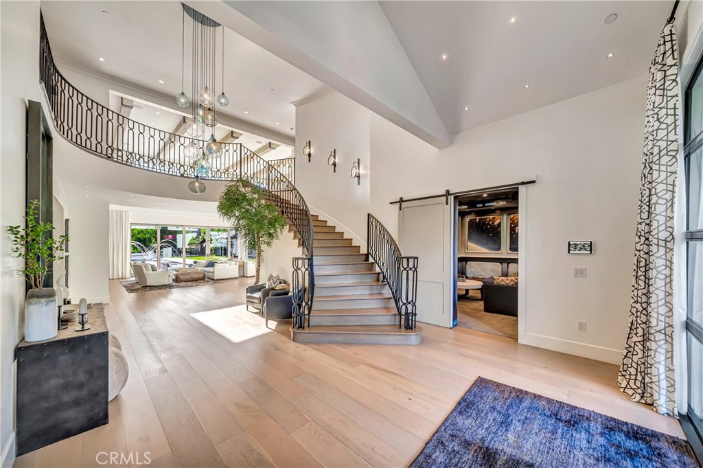 2037 Delphine Lane Calabasas, CA 91302 - Photo 11 of 75 a view of entryway and hall with wooden floor