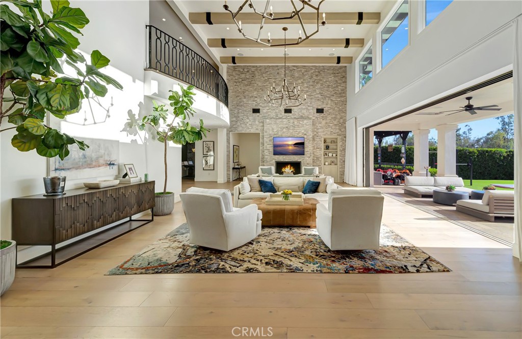 2037 Delphine Lane Calabasas, CA 91302 - Photo 14 of 75 a living room with patio furniture and a potted plant