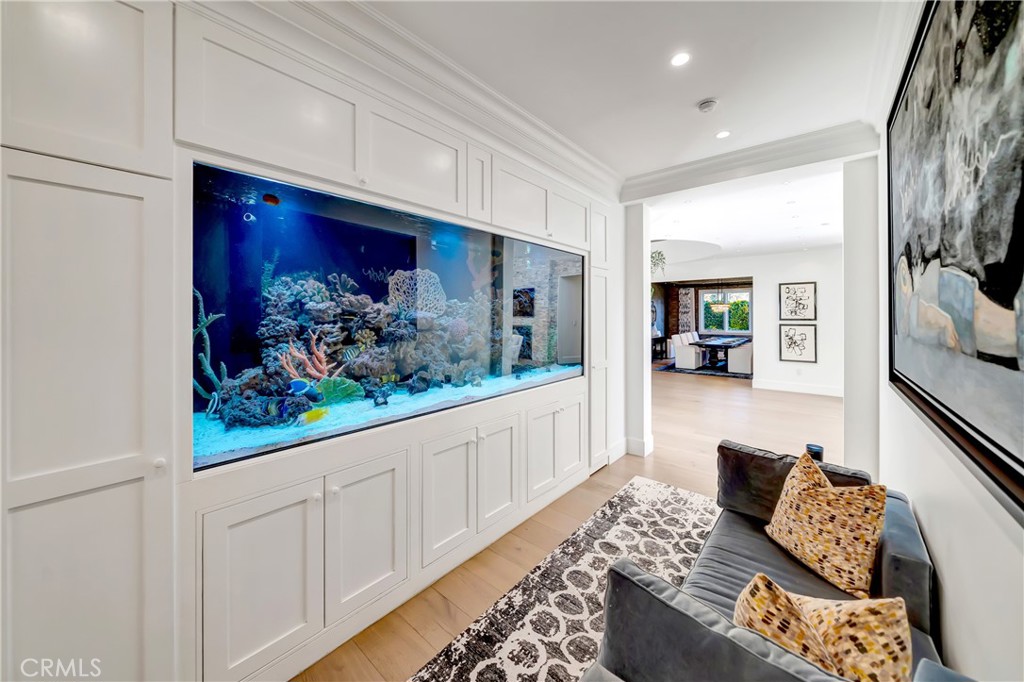 2037 Delphine Lane Calabasas, CA 91302 - Photo 20 of 75 a living room with furniture and a wooden floor