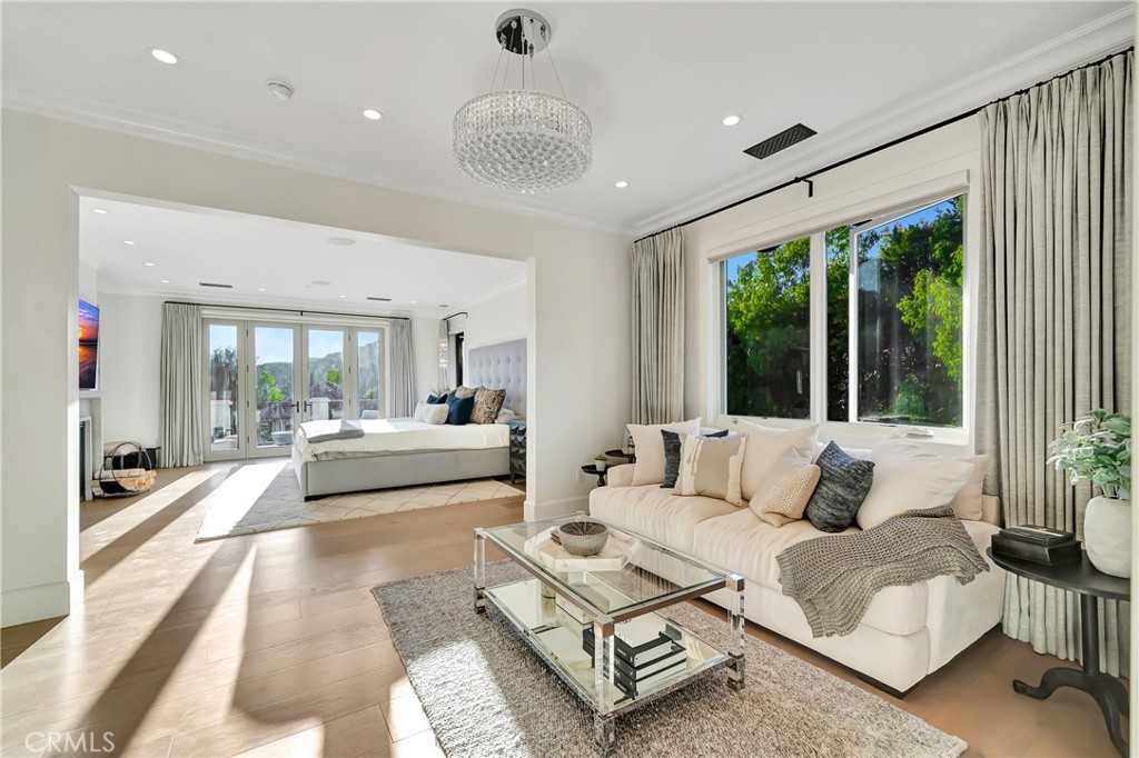 2037 Delphine Lane Calabasas, CA 91302 - Photo 28 of 75 a living room with furniture and a large window