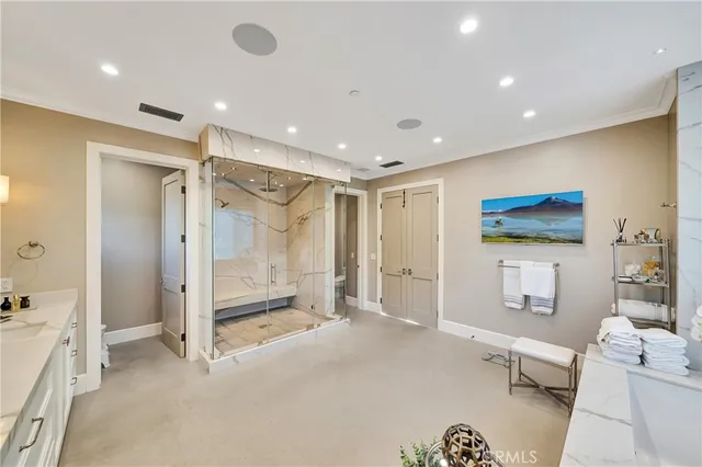 a utility room with sink dryer and washer