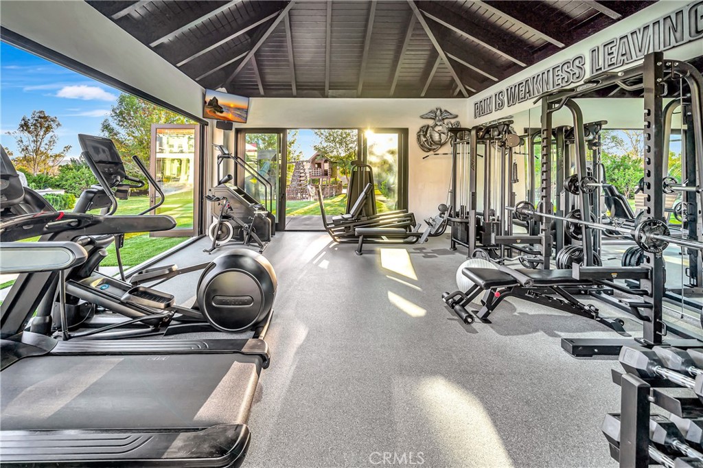 2037 Delphine Lane Calabasas, CA 91302 - Photo 48 of 75 a view of a room with gym equipment
